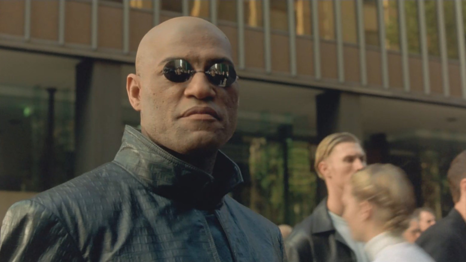 Матрица — это система, Нео. Эта система — наш враг. Когда ты внутри, ты осматриваешься, что ты видишь? Бизнесмены, учителя, адвокаты, плотники. Люди, которых мы пытаемся спасти, но пока они подключены, они все еще часть системы, а значит — наши враги. Ты должен понять, что большинство этих людей не готовы к отключению. И множество из них очень привязаны к системе, поэтому они будут бороться за нее… Ты слушаешь меня, Нео, или любуешься на женщину в красном платье? Оглянись.